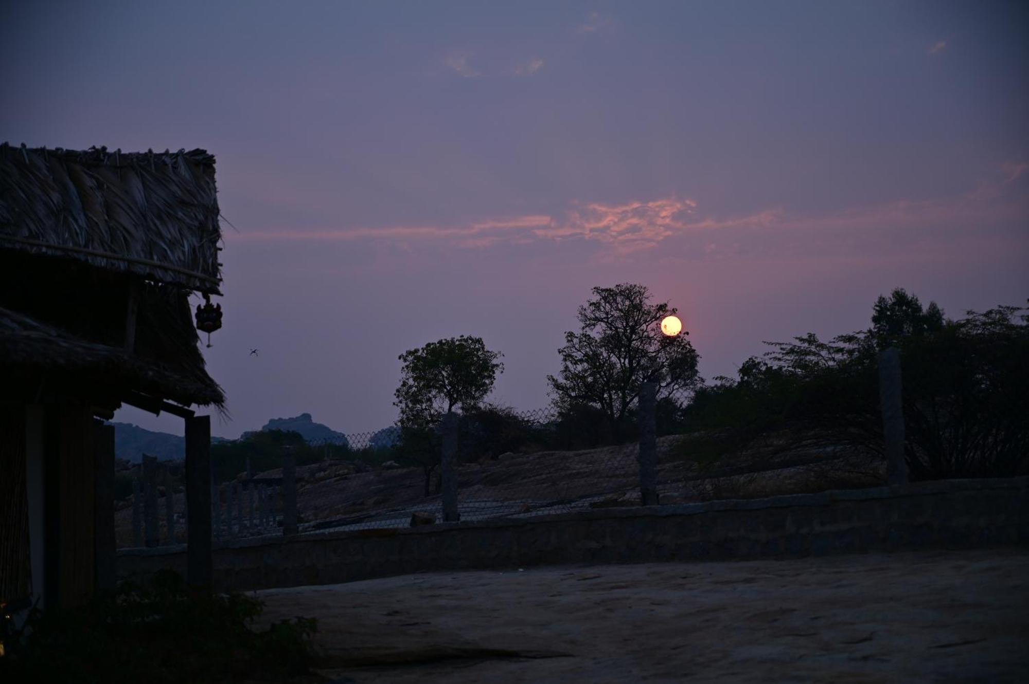 The Hampi Cafe Hotel Exterior photo