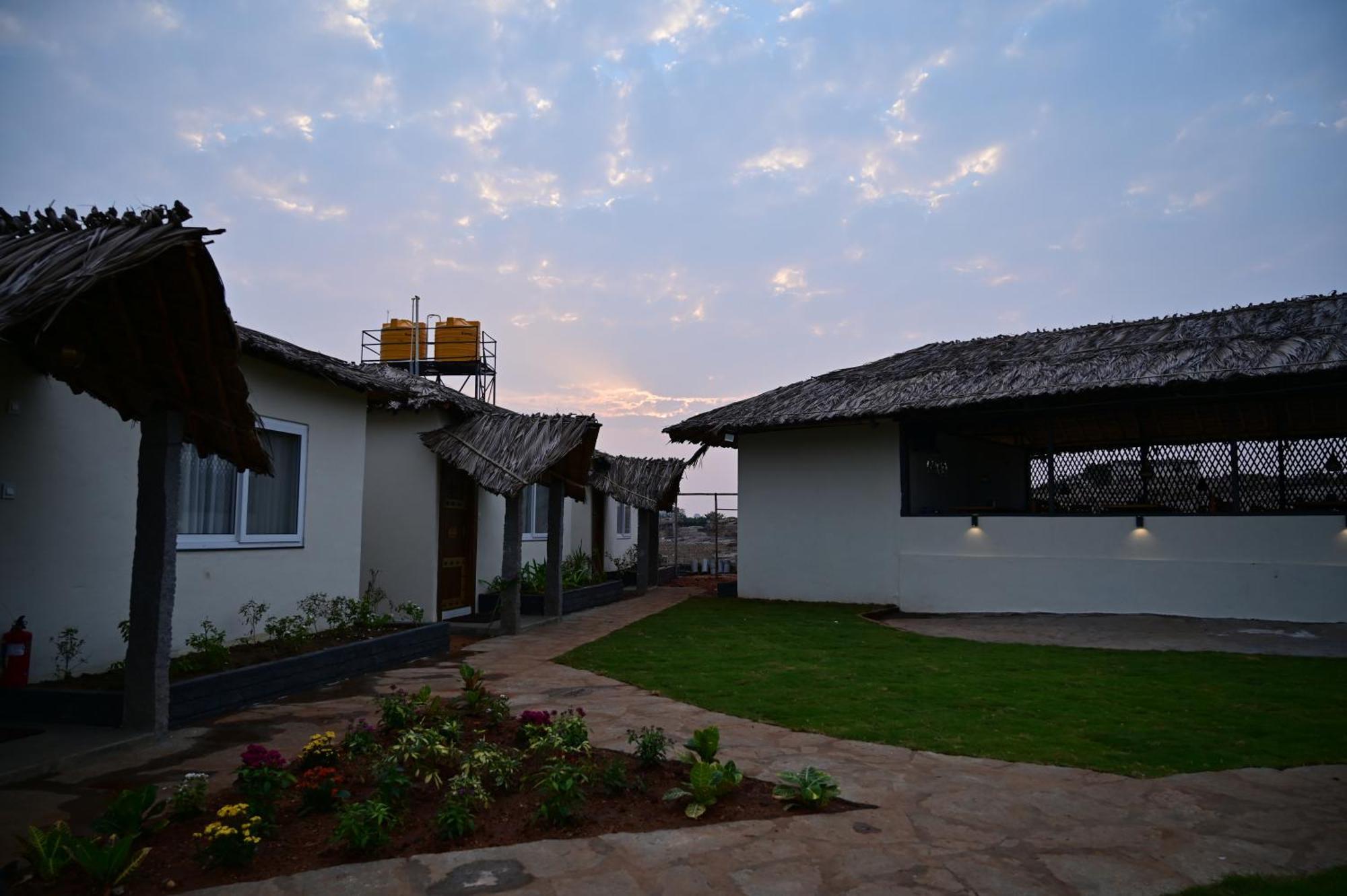 The Hampi Cafe Hotel Exterior photo